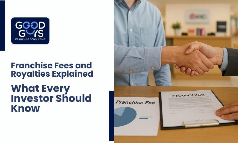 Business handshake and franchise agreement illustrating franchise fees and royalties explained.